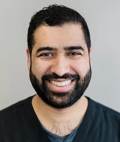 Dr Saud Kottapalli, DDS smiling at the camera